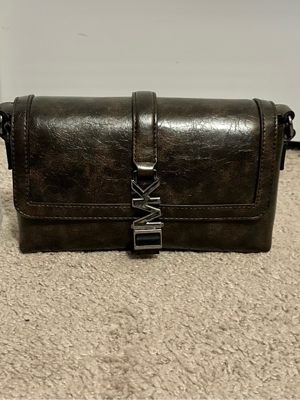 Cool Michael Kors chocolate brown fold over clasp close guitar crossbody strap